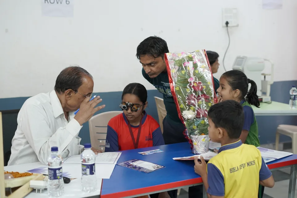 School community participating in the March 2026 medical camp at BOMIS Naubatpur