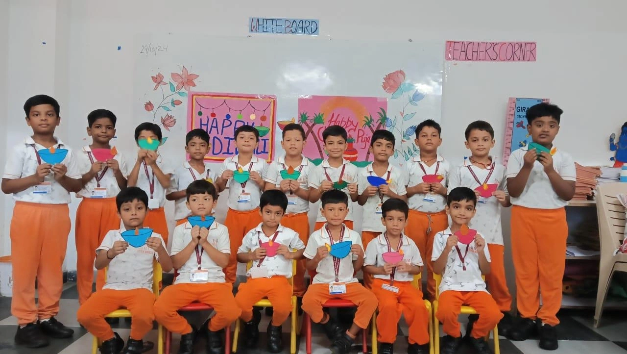 Primary students displaying colourful paper crafts in their classroom
