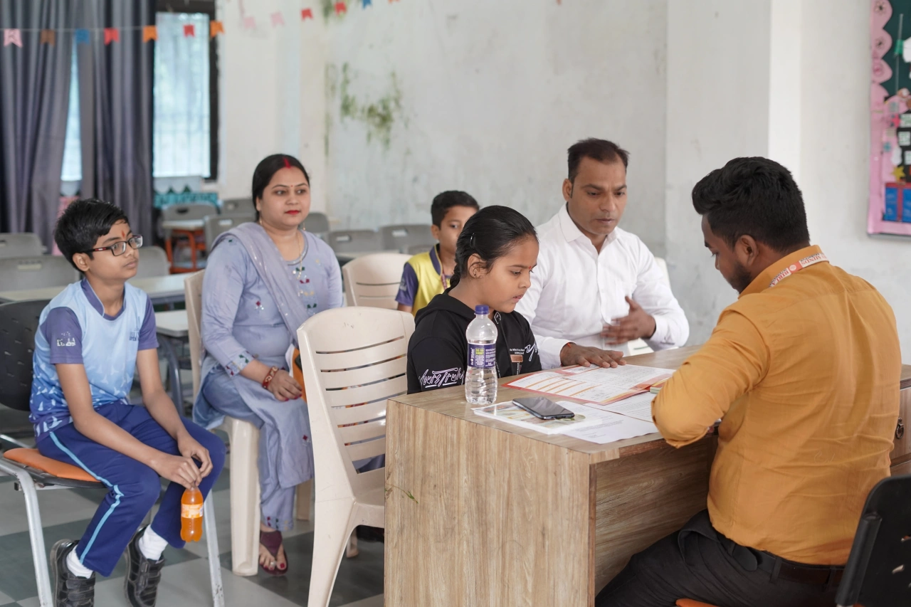 Parents and teachers during the 2026 annual parent–teacher meeting at BOMIS Naubatpur