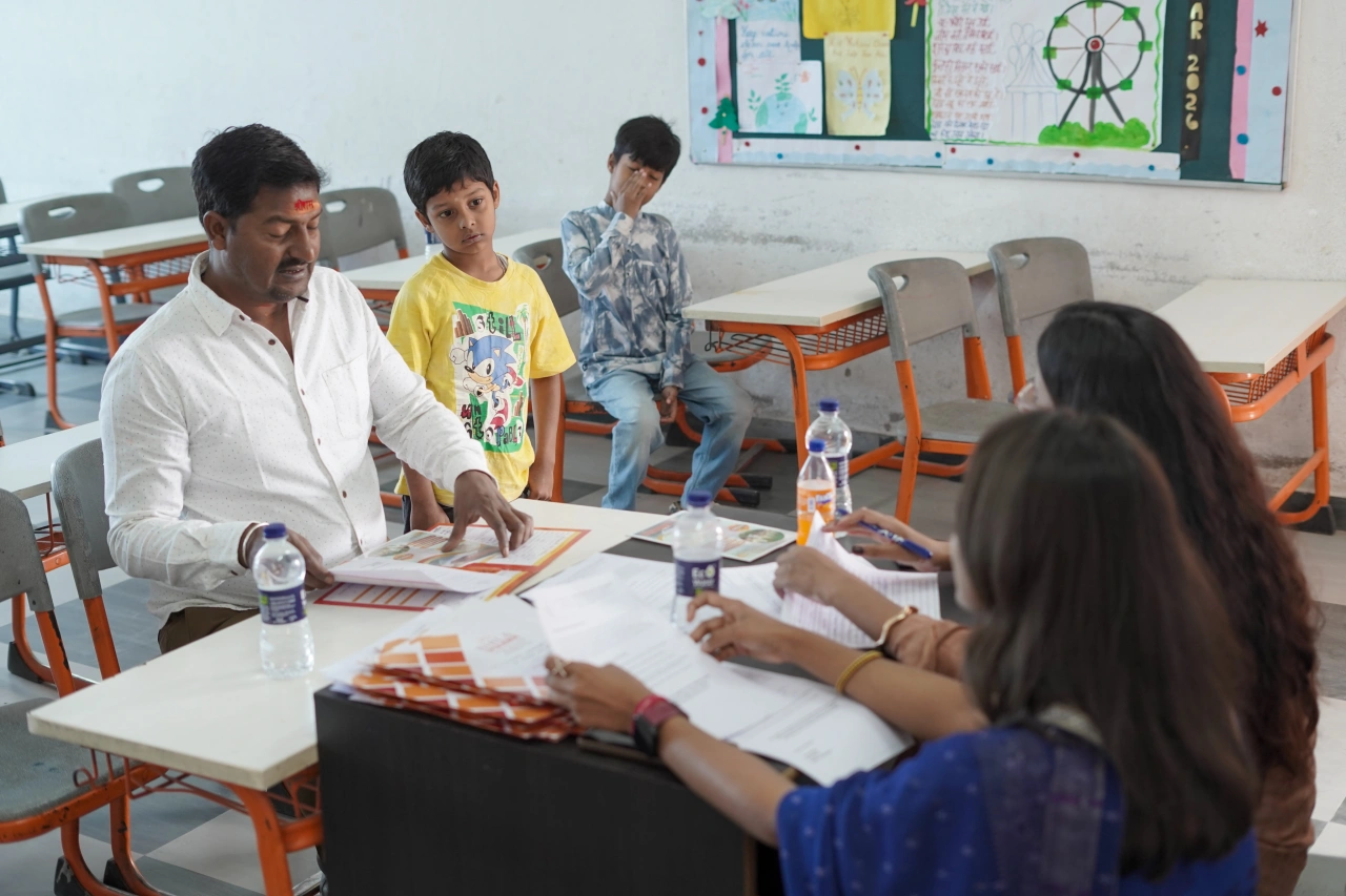 Parents and teachers during the 2026 annual parent–teacher meeting at BOMIS Naubatpur