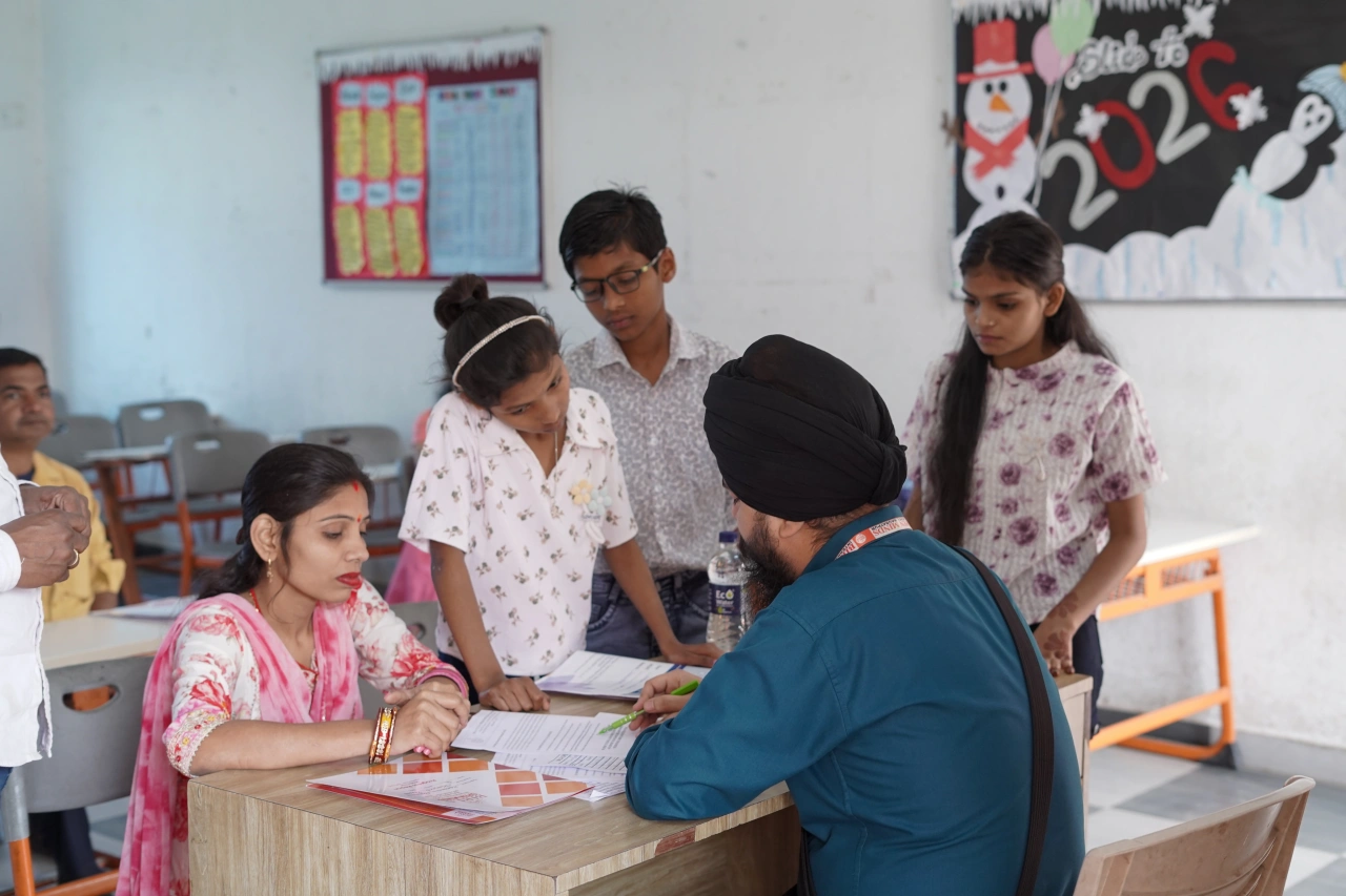 Parents and teachers during the 2026 annual parent–teacher meeting at BOMIS Naubatpur