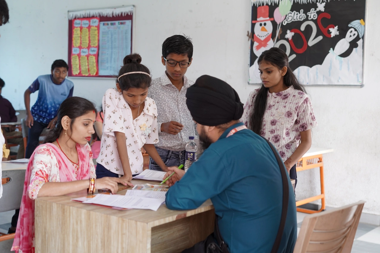Parents and teachers during the 2026 annual parent–teacher meeting at BOMIS Naubatpur