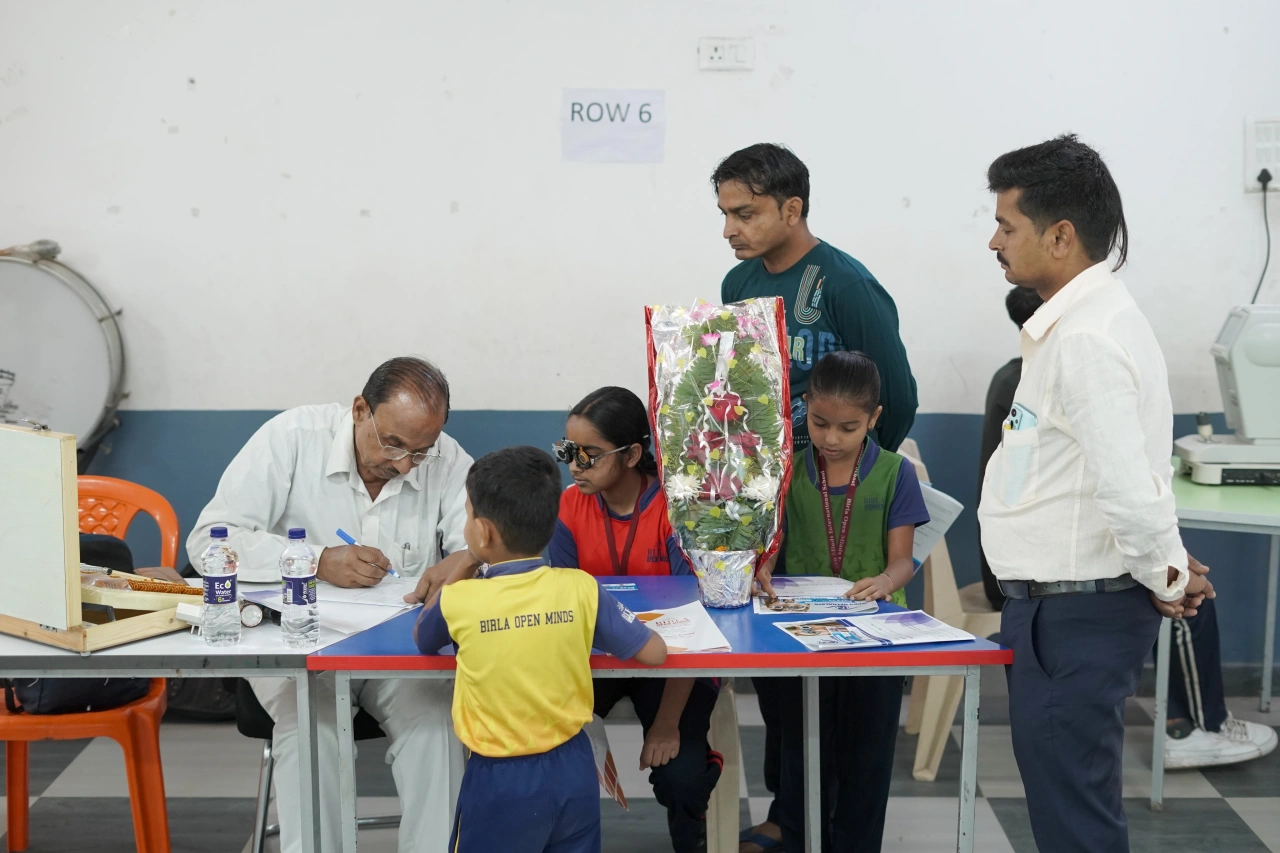 School community participating in the March 2026 medical camp at BOMIS Naubatpur