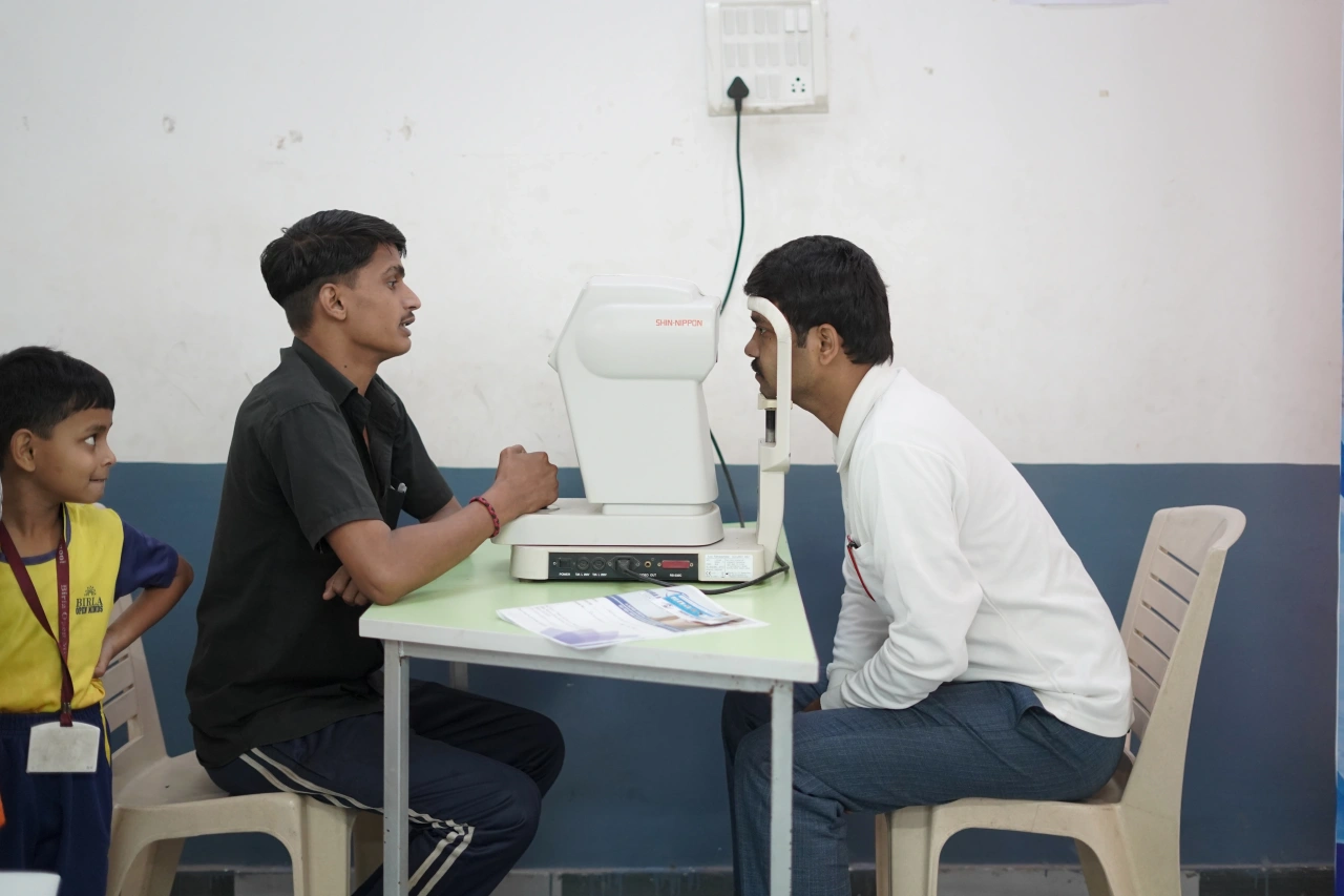 School community participating in the March 2026 medical camp at BOMIS Naubatpur